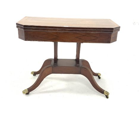  Regency mahogany card table, with rosewood cross banded and string inlaid top hinged to reveal baize lined playing surface, 