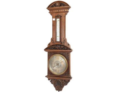  Victorian carved oak aneroid barometer and thermometer, with silvered registers, H101cm   - Condition Report 