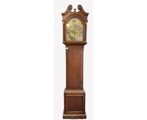  Early 20th century eight day longcase clock, swan neck pediment over turned pilasters, 12" arched brass dial with silvered R