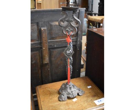 A Victorian design cast-iron pricket candlestick 51cm