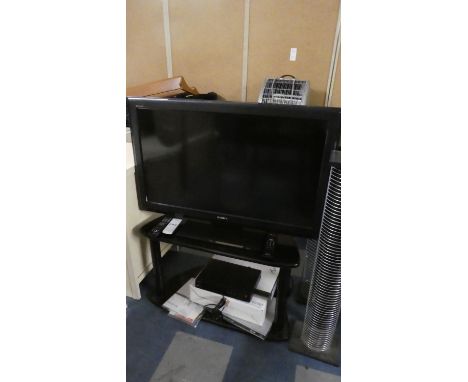 A Sony LCD Digital Colour 36" Television (2009) with Stand Digital Recorder and Pair of CD/DVD Racks, Remotes Etc. 