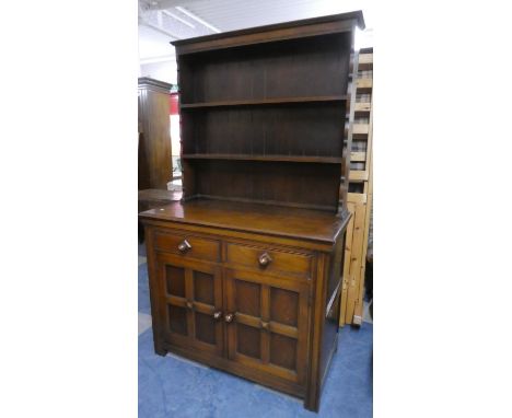 A Mid 20th Century Oak Dresser with Two Drawers Over Cupboard and Raised Three Shelf Rack, 107cms Wide 