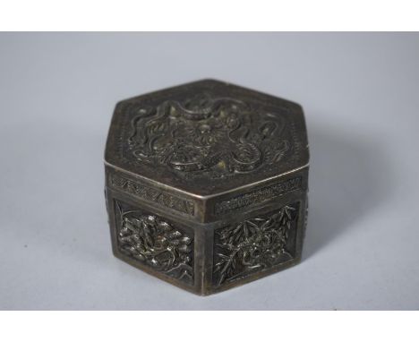 A Chinese Silver Hexagonal Box Decorated in Relief with Foliate Panels to Each Facet and Lid with Dragons Around Flaming Pear