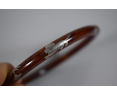 A Silver &amp; Tortoiseshell Bangle, 9.5cms 