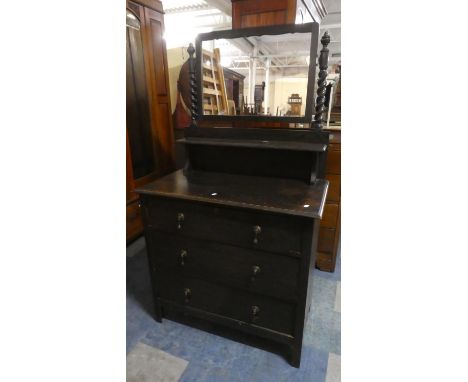 An Edwardian Oak Three Drawer Dressing Chest with Barley Twist Supports to Mirror and Raised Shelf, 83cms Wide 