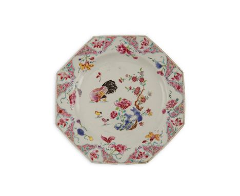 A Chinese famille rose ‘chickens’ octagonal plate, Qianlong period, painted with a hen and chicks amid rockwork and flowers, 