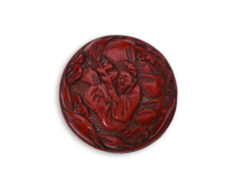 A Chinese cinnabar lacquer seal paste box, 19th century, carved in relief to each side with figures in landscape scenes, 4.7c