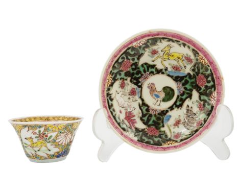 A Chinese semi-eggshell porcelain saucer and a similar tea bowl, Yongzheng period, each painted with goats and chickens, the 