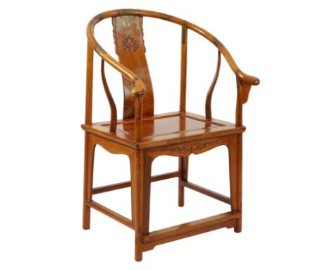 A Chinese huanghuali and brass mounted horseshoe-back armchair, quanyi, late 19th century, the central curved rectangular spl