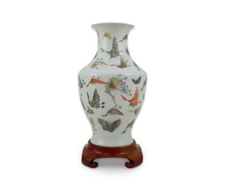 A Chinese enamelled porcelain ‘Hundred Butterfly’ vase, Qianlong mark, Republic period, painted with numerous butterflies in 