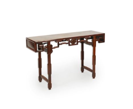 A Chinese hongmu and burrwood panelled altar table, late 19th century, the panelled rectangular top above a scroll work friez