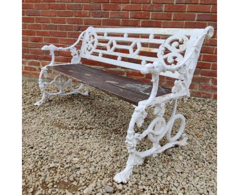 A Victorian cast iron vine and serpent decorated garden bench, with dog head terminals to the arms, cast pierced back and sla