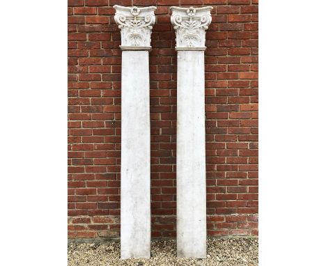 Two marble architectural pilasters, with Corinthian capitals38cm wide x 231.5cm highQty: 2Some chips and losses overall.