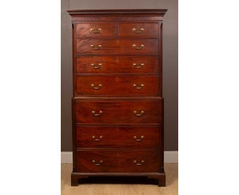 A George III mahogany chest on chest with dentil cornice, fluted canted corners and all on bracket feet104cm wide x 59cm deep