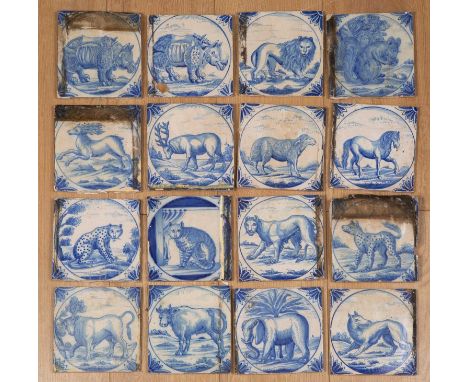 A collection of 18th or 19th century blue and white Delftware tiles depicting various exotic wild animals to include lions, r