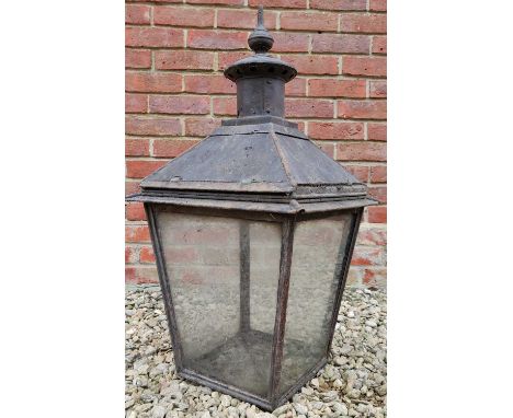An old painted iron lantern40.5cm square x 76cm high overallQty: 1Signs of rust. arks, dents and scratches overall.