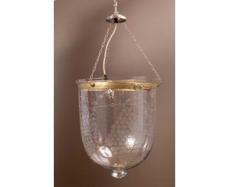 A cut glass light shade engraved with grapevine decoration42cm x 35cmQty: 1The brass band around the top sits somewhat loose.