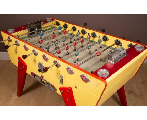 A mid-20th century Stella Champion yellow foosball table155cm wide x 96cm deep x 92cm highQty: 1In generally good condition. 