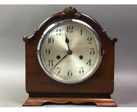 GEORGE V ENFIELD MANTEL CLOCK EARLY 20TH CENTURY with circular dial and cased in mahogany24.5cm high 