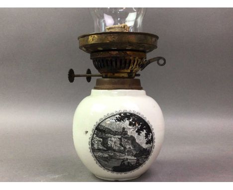 VICTORIAN OIL LAMP  AND OTHER COLLECTOR'S ITEMS the ceramic base with transfer printed decoration, with clear chimney, togeth