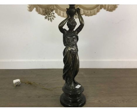 SPELTER FIGURAL LAMP with cream fringed shade 