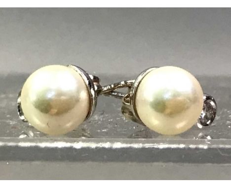 PAIR OF PEARL EARRINGS each set small diamondPearls are half a centimetre, diamonds are small