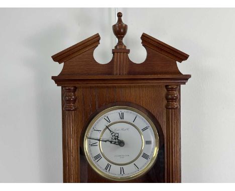 20TH CENTURY WALL CLOCK AND OTHER CLOCKS the clock by London Clock Co, complete with centre finial to top, along with two oth