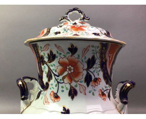 VICTORIAN IRONSTONE POT WITH COVER MID 19TH CENTURY  decorated in the Imari palette with stylised floral designs42cm high