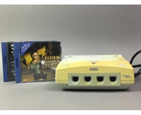 SEGA DREAMCAST CONSOLE AND CONTROLLER LOOSE with cables, three games comprising Tomb Raider: The Last Revelation, Virtua Figh