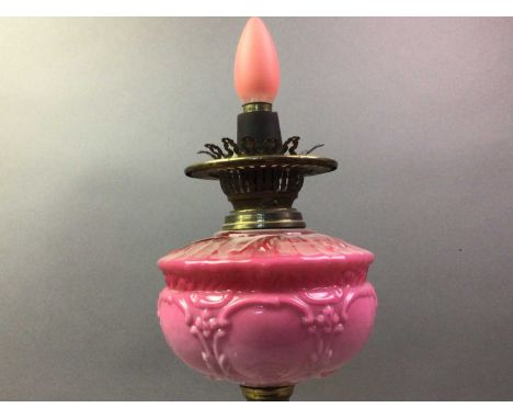 VICTORIAN BRASS OIL LAMP with pink glass reservoir47cm high