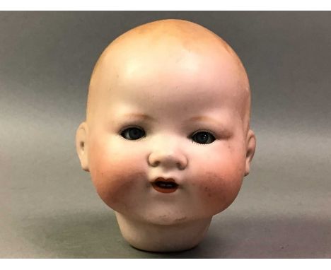 ARMAND MARSEILLE BISQUE DOLL HEAD AND OTHER TOYS  including further early 20th century dolls and doll parts, marbles and a so