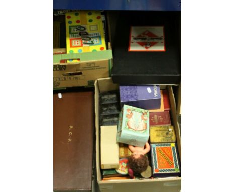 Large quantity of boxed games and toys together with advertising boxes, bagatelle board, card table, etc