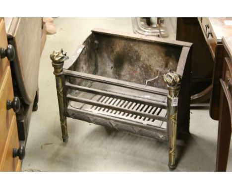 19th century Brass and Cast Iron Fire Grate with Brass Finials in the form of Flames, 58cms long