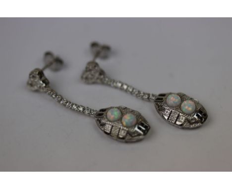 Pair of silver and opal drop earrings