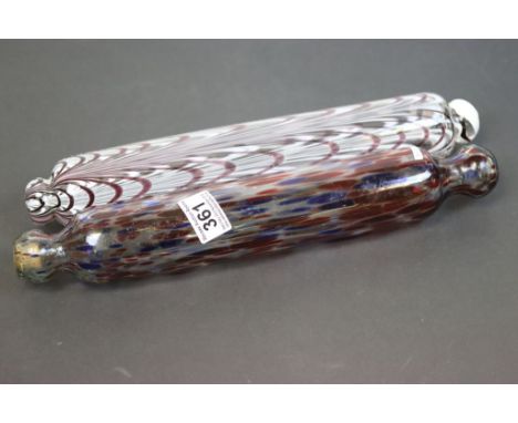 19th Century Nailsea type rolling pin with red and blue flecked decoration, 37cms and another with extremely brown and white 