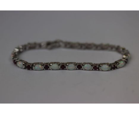 Silver ruby and opal line bracelet 