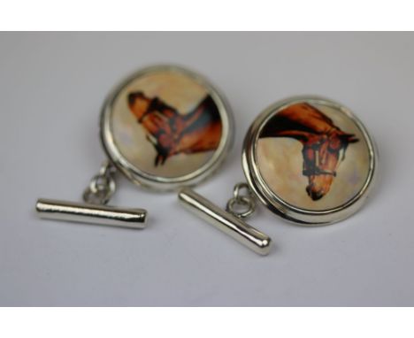 Pair of silver and enamel cufflinks depicting horses 