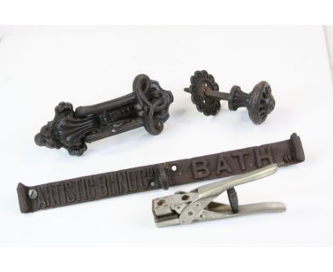 Antique Kenrick style cast iron door knocker, a similar door handle with registration diamond mark and a small cast iron sign