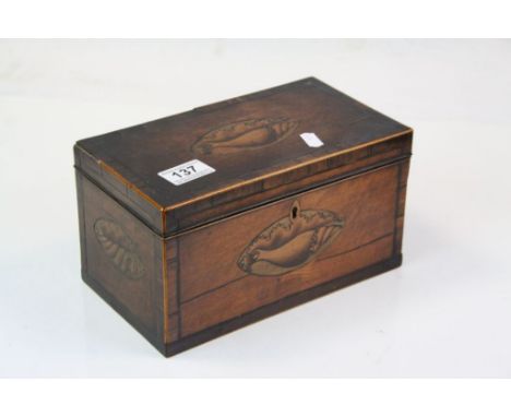 Mahogany Georgian tea caddy with fitted interior and inlaid shell decoration 