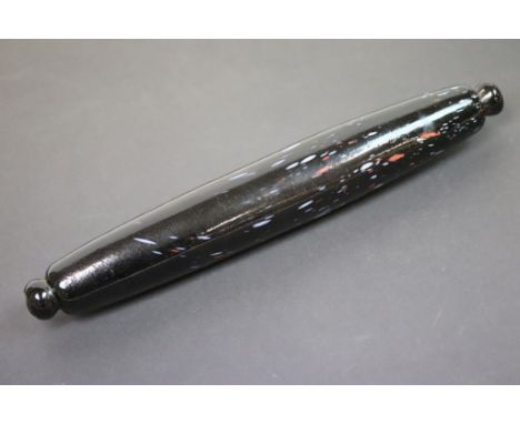 Nailsea type rolling pin with flecked decoration on a dark background, 36cms and a cobalt blue glass rolling pin, 37cms (2)