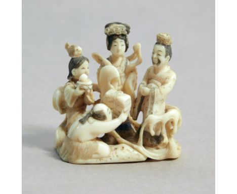 A 19th century Japanese netsuke from Meiji period. Signed Kotekisai-Rakumin on the base. In carved elephant ivory portraying 