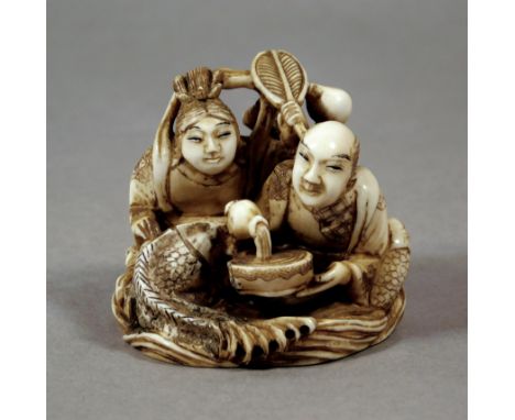 A 19th century Japanese netsuke okimono from Meiji period. Signed on a red kanji on the base. In carved elephant ivory portra