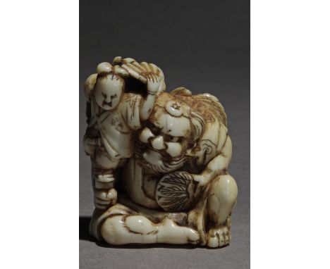 A Japanese netsuke from Edo period circa 1825-1850. Signed Gyokusen on the base. In carved ivory portraying Sojobo, king of t