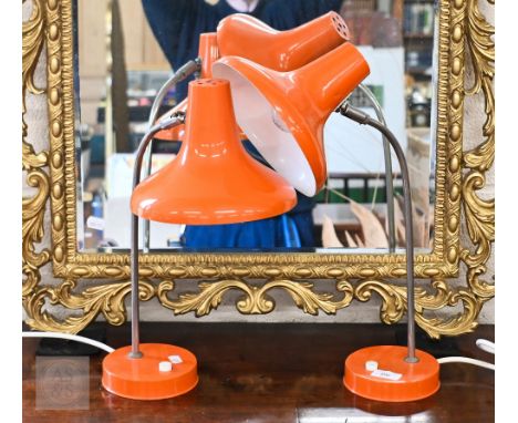 Two 1970s vintage orange-enamelled reading lamps, 45 cm high (2)