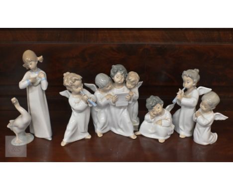 Five Lladro figures/groups of angelic children to/w a goose and a girl with a ukelele latter a/f 