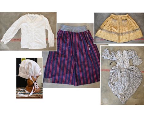 A Victorian floral-printed dress with bustle, to/w a vintage Indian printed yellow cotton skirt, a vintage striped linen long