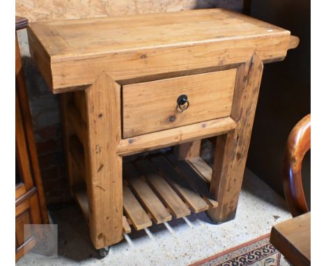 A vintage waxed pine 'Butcher's block' kitchen unit with single drawer and slatter undertier, 100 x 44 x 90 cm high