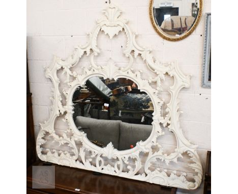 A large Chippendale style painted over mantel mirror with scrolling foliate open frame, 260 x 145 cm h
