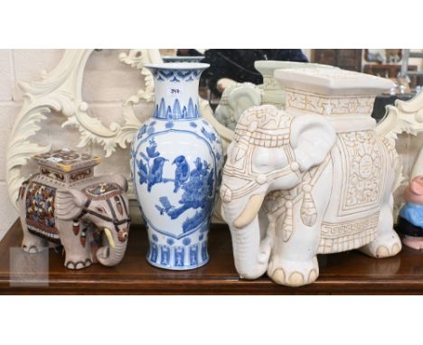 An Asian cream-glazed pottery 'elephant' stool/plant-stand, 46 cm to/w a smaller example and a Chinese blue and white baluste