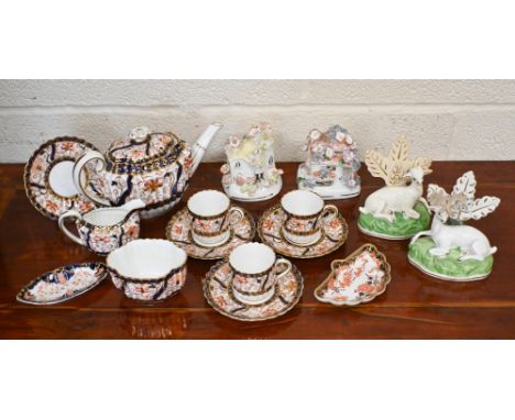 Two Royal Crown Derby Imari pin-dishes and a Copeland Imari part tea service to/w two Staffordshire cottage pastille burners 